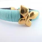Blue Thick Leather Bracelet With A Gold Plated..