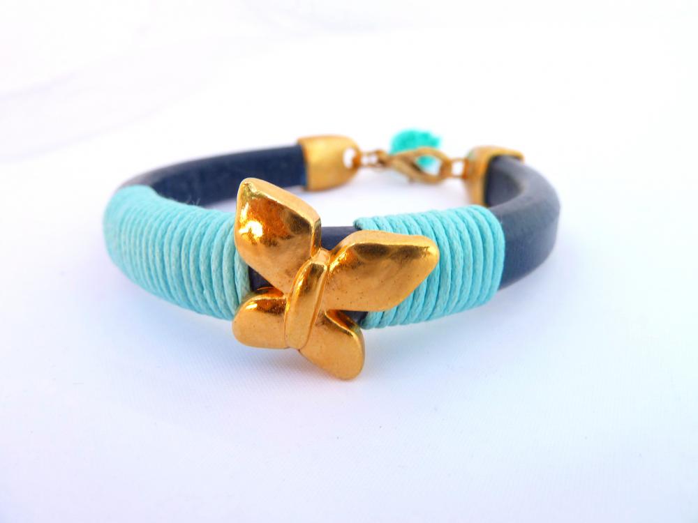 Blue Thick Leather Bracelet With A Gold Plated Butterfly And Light Bue Waxed Cotton Cord